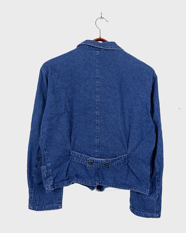 Indulge in your love for denim with this vintage 80s two rows blazer in classic blue. A must-have for any denim enthusiast, this jacket is a timeless addition to your wardrobe.