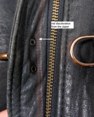Introducing this Vintage 80s black fireman clasp leather coat, a must-have piece for your collection. Made of buttery soft leather, this coat exudes a cool and edgy vibe.