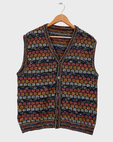 Capture some Missoni-inspired magic with this vintage 80s vest!