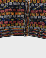 Capture some Missoni-inspired magic with this vintage 80s vest!