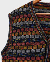 Capture some Missoni-inspired magic with this vintage 80s vest!