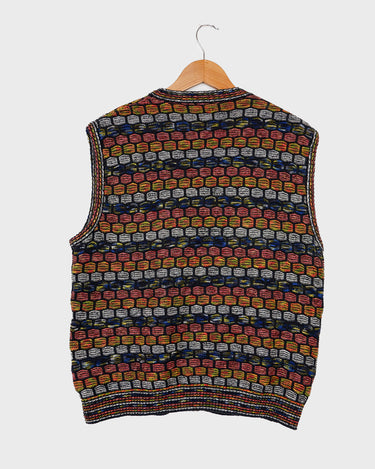 Capture some Missoni-inspired magic with this vintage 80s vest!