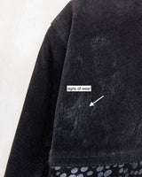 This vintage black leather coat blends matte suede leather with subtly glossy smooth leather panels in rich black tones. The unique patchwork design, featuring delicate dot-textured sections, adds depth, texture, and quiet individuality. With its sleek cut, button front, and spacious pockets, this timeless piece is full of character – perfect for those who appreciate quality and one-of-a-kind style.