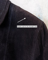 This vintage black leather coat blends matte suede leather with subtly glossy smooth leather panels in rich black tones. The unique patchwork design, featuring delicate dot-textured sections, adds depth, texture, and quiet individuality. With its sleek cut, button front, and spacious pockets, this timeless piece is full of character – perfect for those who appreciate quality and one-of-a-kind style.