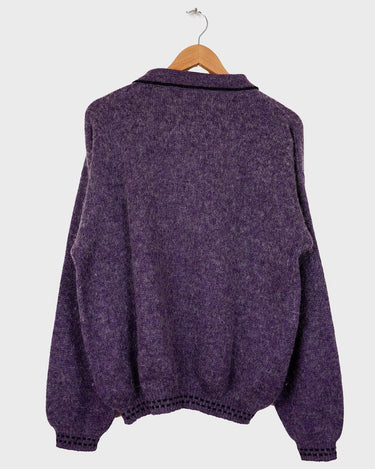 This vintage 80s sweater is sure to add a splash of purple passion to any wardrobe! Crafted from a blend of alpaca, lana wool and acryl mix this sweater is perfect to survive the cold winter days. ﻿