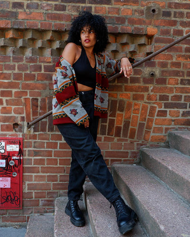 Snuggle up with this vintage 80s boho fleece jacket! With a red and grey color combo, floral pattern, and unbelievably soft feel, you'll be swaddled in comfort with every wear. Cozyness is definitely calling!