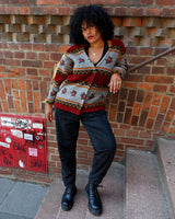 Snuggle up with this vintage 80s boho fleece jacket! With a red and grey color combo, floral pattern, and unbelievably soft feel, you'll be swaddled in comfort with every wear. Cozyness is definitely calling!