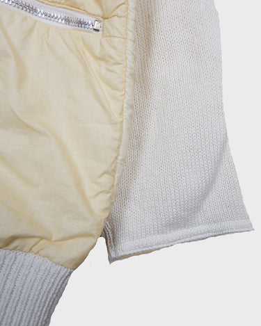 Rare 80s collab between French art rebel Castelbajac and Italian luxury label ICEBERG. A bold mix of soft knit sleeves and lightweight woven fabric, detailed with silver snaps and zip pockets. Playful, offbeat, and seriously collectible.