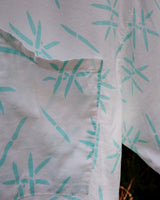 Sun’s out, button up! This Italian vintage white polo shirt brings serious 80s energy with its sharp button-up neckline and eye-catching turquoise pattern. A rare vintage gem that’s equal parts sporty, stylish, and a little cheeky. Wear it loud, wear it proud – this polo’s got main character energy.