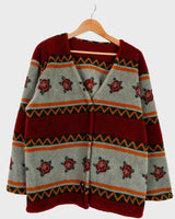 Snuggle up with this vintage 80s boho fleece jacket! With a red and grey color combo, floral pattern, and unbelievably soft feel, you'll be swaddled in comfort with every wear. Cozyness is definitely calling!