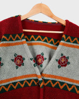 Snuggle up with this vintage 80s boho fleece jacket! With a red and grey color combo, floral pattern, and unbelievably soft feel, you'll be swaddled in comfort with every wear. Cozyness is definitely calling!