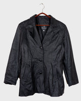 Sleek, edgy, and timeless – this vintage 80s black leather jacket is a true classic.
Made from genuine leather with a clean, structured fit, this piece blends bold 80s energy with modern minimalism. The sharp cut gives that effortlessly cool edge, perfect for everyday wear.