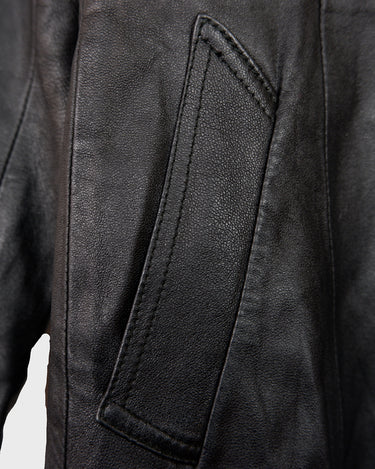 Sleek, edgy, and timeless – this vintage 80s black leather jacket is a true classic.
Made from genuine leather with a clean, structured fit, this piece blends bold 80s energy with modern minimalism. The sharp cut gives that effortlessly cool edge, perfect for everyday wear.