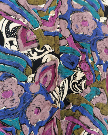 Everyone needs a little 'flare' in their life, and this colorful vintage 80s 90s floral pattern viscose shirt has just that! Perfect for all you flower-power enthusiasts, this shirt features an elastic hem for a snug fit, and adds a vibrant touch to your closet! Go ahead, get groovin'!