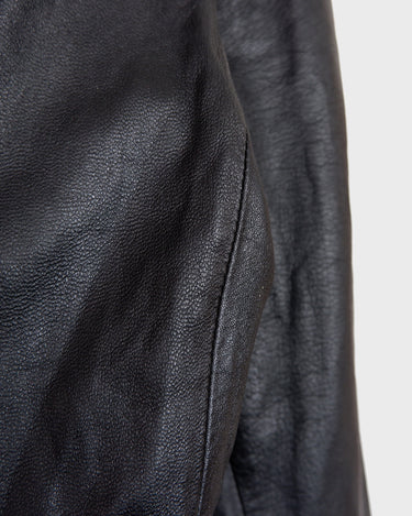 Sleek, edgy, and timeless – this vintage 80s black leather jacket is a true classic.
Made from genuine leather with a clean, structured fit, this piece blends bold 80s energy with modern minimalism. The sharp cut gives that effortlessly cool edge, perfect for everyday wear.