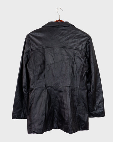 Sleek, edgy, and timeless – this vintage 80s black leather jacket is a true classic.
Made from genuine leather with a clean, structured fit, this piece blends bold 80s energy with modern minimalism. The sharp cut gives that effortlessly cool edge, perfect for everyday wear.