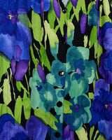 This Vintage 80s 90s blue green dress has it all – a timeless silhouette, a midi length, a button up design and a lightweight fabric!