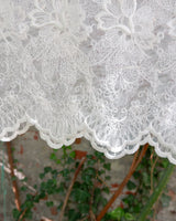 Ditch the boring basics—this handmade lace top is crafted from upcycled curtains. With its romantic vibes, sheer elegance, and intricate embroidery, it’s perfect for layering and embracing your boho side. This one-of-a-kind piece is sustainably made and packed with attitude. Who knew curtains could slay this hard?