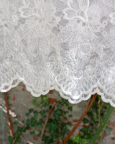 Ditch the boring basics—this handmade lace top is crafted from upcycled curtains. With its romantic vibes, sheer elegance, and intricate embroidery, it’s perfect for layering and embracing your boho side. This one-of-a-kind piece is sustainably made and packed with attitude. Who knew curtains could slay this hard?