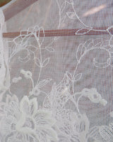 Ditch the boring basics—this handmade lace top is crafted from upcycled curtains. With its romantic vibes, sheer elegance, and intricate embroidery, it’s perfect for layering and embracing your boho side. This one-of-a-kind piece is sustainably made and packed with attitude. Who knew curtains could slay this hard?