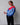 Feel those 70s 80s fashion vibes with this 70s/80s striped sweater featuring a unique bat silhouette. The red & blue color combo is a perfect way to add some pop of color to your wardrobe. 