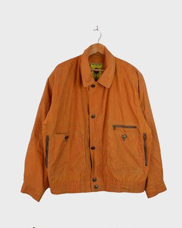 Break out your sense of adventure with this vibrant yellow/orange (like mustard yellow!) light BOGNER Jacket! Crafted with Bogner's signature high quality, this lightweight and comfortable piece will have you ready to explore in style. Its unique shoulder pads and arty back add a playful touch, making it your perfect companion when you’re on the go! Excited yet? Please have a look at the last photo for a color reference at the daylight.