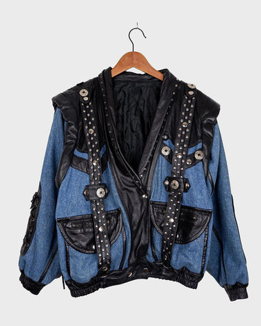 This vintage 80s masterpiece is a patch-perfect combination of denim and leather! Made with premium materials to give your look a unique edge. Adjustable sleeves with a zipper can easily transform it into a vest. Go ahead, have fun with your style!