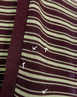 This vintage piece is sure to be a hit! Get out of the ordinary and jump into the ‘90s with this vintage brown vest - fun green stripes make it a true stand-out. It's an old-school classic with an updated twist! Please keep in mind, that this vest has some stains and flaws (last photos)