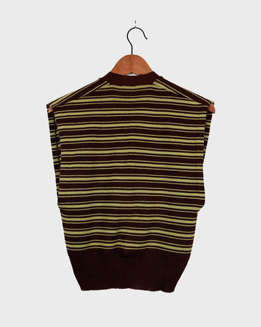 This vintage piece is sure to be a hit! Get out of the ordinary and jump into the ‘90s with this vintage brown vest - fun green stripes make it a true stand-out. It's an old-school classic with an updated twist! Please keep in mind, that this vest has some stains and flaws (last photos)