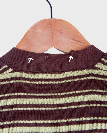 This vintage piece is sure to be a hit! Get out of the ordinary and jump into the ‘90s with this vintage brown vest - fun green stripes make it a true stand-out. It's an old-school classic with an updated twist! Please keep in mind, that this vest has some stains and flaws (last photos)