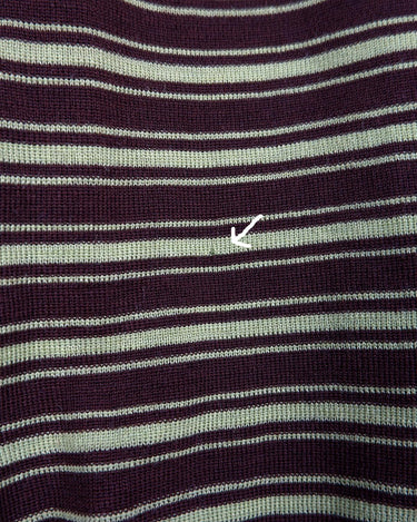 This vintage piece is sure to be a hit! Get out of the ordinary and jump into the ‘90s with this vintage brown vest - fun green stripes make it a true stand-out. It's an old-school classic with an updated twist! Please keep in mind, that this vest has some stains and flaws (last photos)