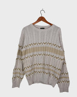 Tired of the same-old, boring sweaters? Look no further than this vintage 80s sweater! It's the perfect mix of classic and oldscool with its dirty white beige hue and classic cable knit pattern. Brown geometric details give it a subtle but unique edge. The thin knit makes it perfect for all-year wear!