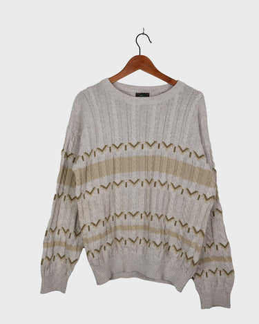 Tired of the same-old, boring sweaters? Look no further than this vintage 80s sweater! It's the perfect mix of classic and oldscool with its dirty white beige hue and classic cable knit pattern. Brown geometric details give it a subtle but unique edge. The thin knit makes it perfect for all-year wear!