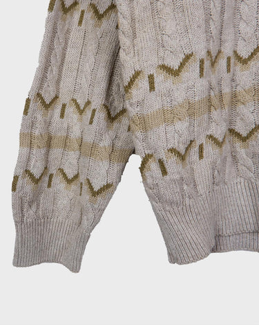 Tired of the same-old, boring sweaters? Look no further than this vintage 80s sweater! It's the perfect mix of classic and oldscool with its dirty white beige hue and classic cable knit pattern. Brown geometric details give it a subtle but unique edge. The thin knit makes it perfect for all-year wear!