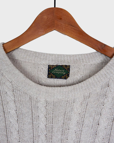 Tired of the same-old, boring sweaters? Look no further than this vintage 80s sweater! It's the perfect mix of classic and oldscool with its dirty white beige hue and classic cable knit pattern. Brown geometric details give it a subtle but unique edge. The thin knit makes it perfect for all-year wear!