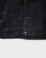 Classy with a hint of wild! This vintage 80s black fringe leather jacket features edgy shoulder pads and flowing fringes. Make a style statement fit for any sassy bohemian lover! 