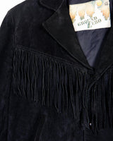 Classy with a hint of wild! This vintage 80s black fringe leather jacket features edgy shoulder pads and flowing fringes. Make a style statement fit for any sassy bohemian lover! 