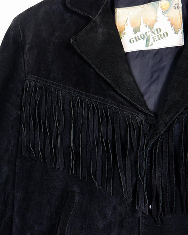 Classy with a hint of wild! This vintage 80s black fringe leather jacket features edgy shoulder pads and flowing fringes. Make a style statement fit for any sassy bohemian lover! 
