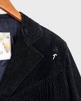 Classy with a hint of wild! This vintage 80s black fringe leather jacket features edgy shoulder pads and flowing fringes. Make a style statement fit for any sassy bohemian lover! 