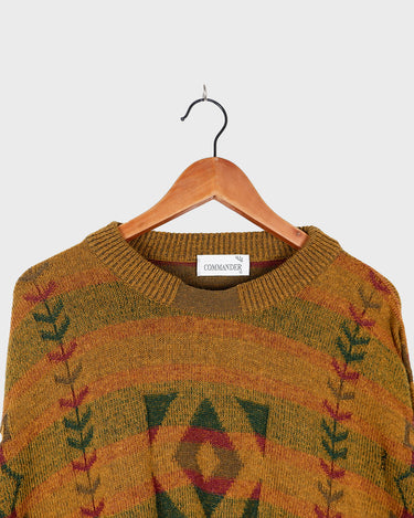 This vintage sweater has fall vibes written all over it, thanks to its alpaca and lambs wool mix in a cozy brown, mustard-yellow combo! 