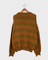 This vintage sweater has fall vibes written all over it, thanks to its alpaca and lambs wool mix in a cozy brown, mustard-yellow combo! 