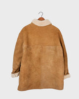 This jacket is an absolute classic! Stay warm in this vintage 80s brown and beige leather winter jacket. Perfect for any size between M - small L, you'll surely slay the day! 