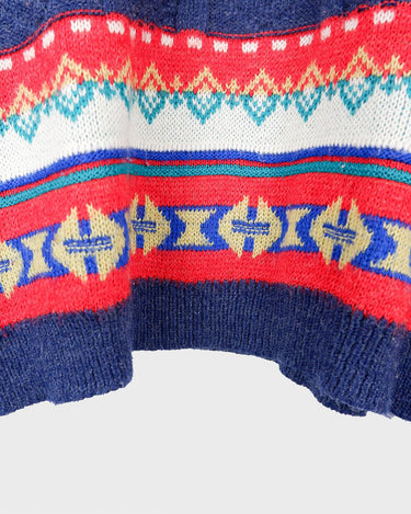 Stay warm and rainbow-bright with this eye-catching United Colors of Benetton shetland wool sweater! Featuring a vibrant array of colors, this classic piece will be sure to up your style game! It's perfect for any season!
