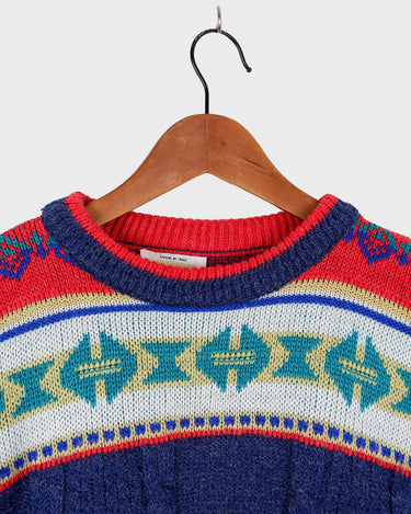 Stay warm and rainbow-bright with this eye-catching United Colors of Benetton shetland wool sweater! Featuring a vibrant array of colors, this classic piece will be sure to up your style game! It's perfect for any season!