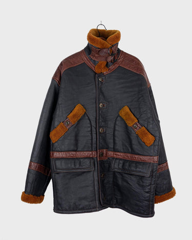 A cold winter won't stand a chance against this premium vintage shearling coat! Crafted in premium-grade black heavy / robust leather, this coat is the perfect option to survive to cold winter days! I promise!