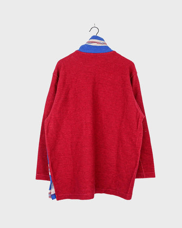 Get cozy in this vintage 90s red and blue striped half zip sweater. Perfect for those chilly days, this sweater is both stylish and comfortable. With its unique half zip design, you can easily adjust the neckline for the perfect fit.