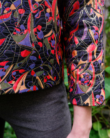 Time to sparkle in this vintage 80s handmade spring jacket (super thin) that shines! With a rainbow of colors and shimmering accents, this lightweight jacket will bring a special touch to your outfit.