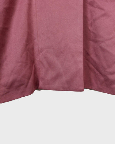 This vintage blazer in a striking dark pink is a must-have for any fashion-forward individual. Its long fit and two rows of buttons add a unique twist to any outfit. Whether you're dressing up for a formal event or adding some flair to your everyday look, this blazer has got you covered. (No time for boring fashion here!)