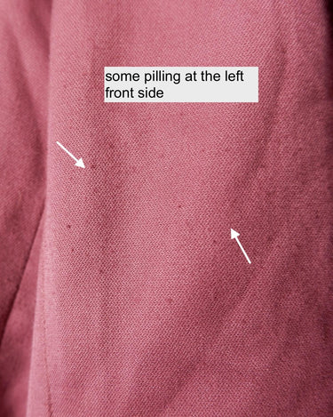 This vintage blazer in a striking dark pink is a must-have for any fashion-forward individual. Its long fit and two rows of buttons add a unique twist to any outfit. Whether you're dressing up for a formal event or adding some flair to your everyday look, this blazer has got you covered. (No time for boring fashion here!)