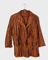Spice up your outfit with this groovy 90s throwback blazer (very thin!)! The funky orange-brown hue will definitely catch some eyes, and the lightweight fabric is ideal for layering.